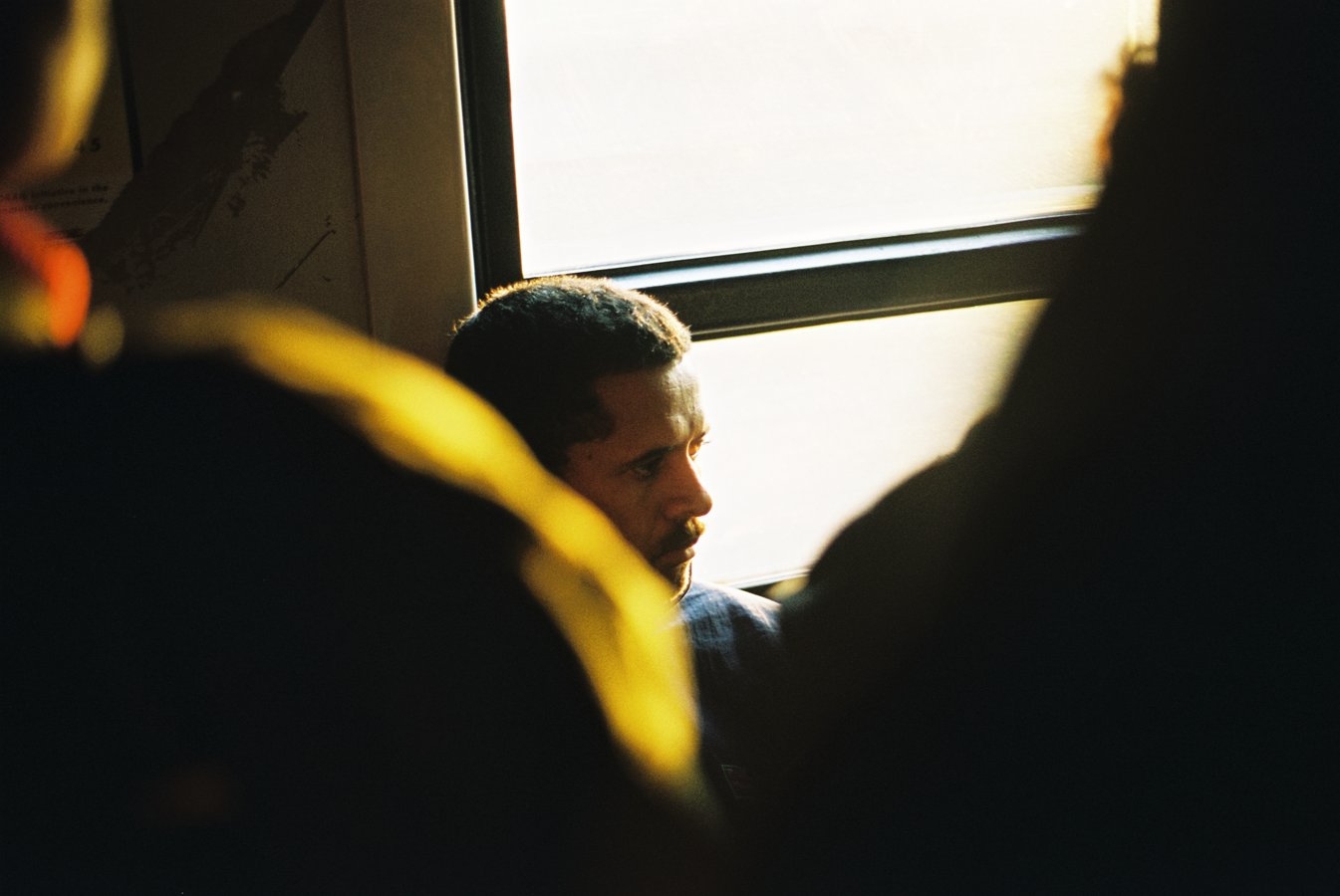 On board the early mornings train from Heideveld station (Cape Flats) to the city. Cape Town, 2003