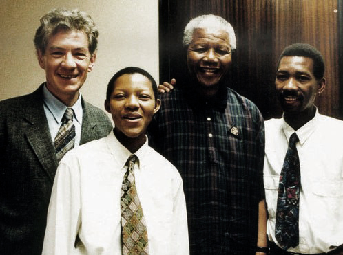 Image: Simon Nkoli, fellow LGBTI activist Phumi Mtetwa and British actor of Shakespeare and Harry Potter fame Sir Ian McKellen meeting with Nelson Mandela. 