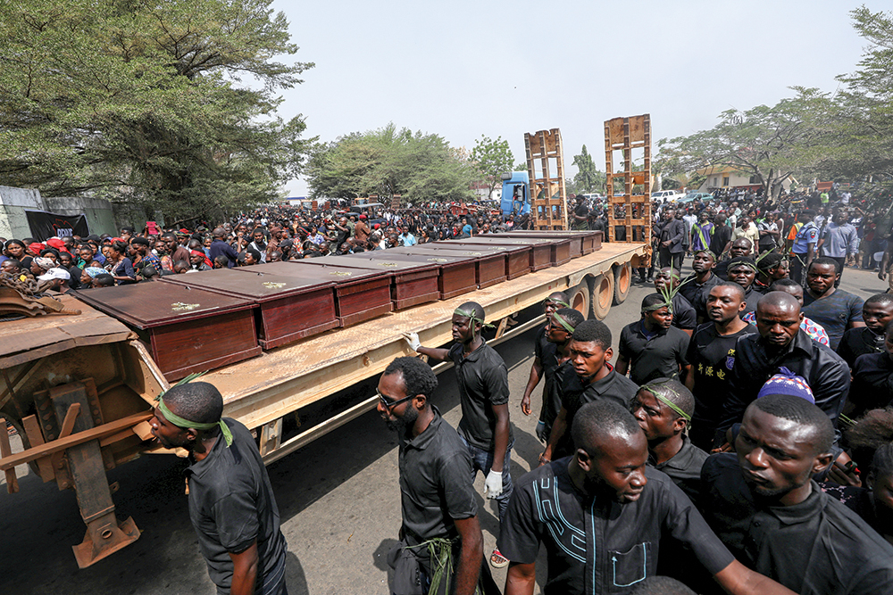 A mass burial of 24 dead, including women and children, killed at Omusu Edimoga by Fulani herdsmen and militants.